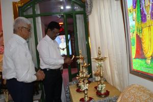 4.(a) Lighting the Lamp by Dr.Natesh, Commissioner, MUDA and Jayasimha, Joint Director, Mysore City Corporation